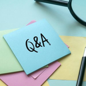 Q_A